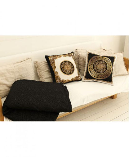 Baroque tapestry pillowcases and matching decor styled on a sofa in an elegant interior