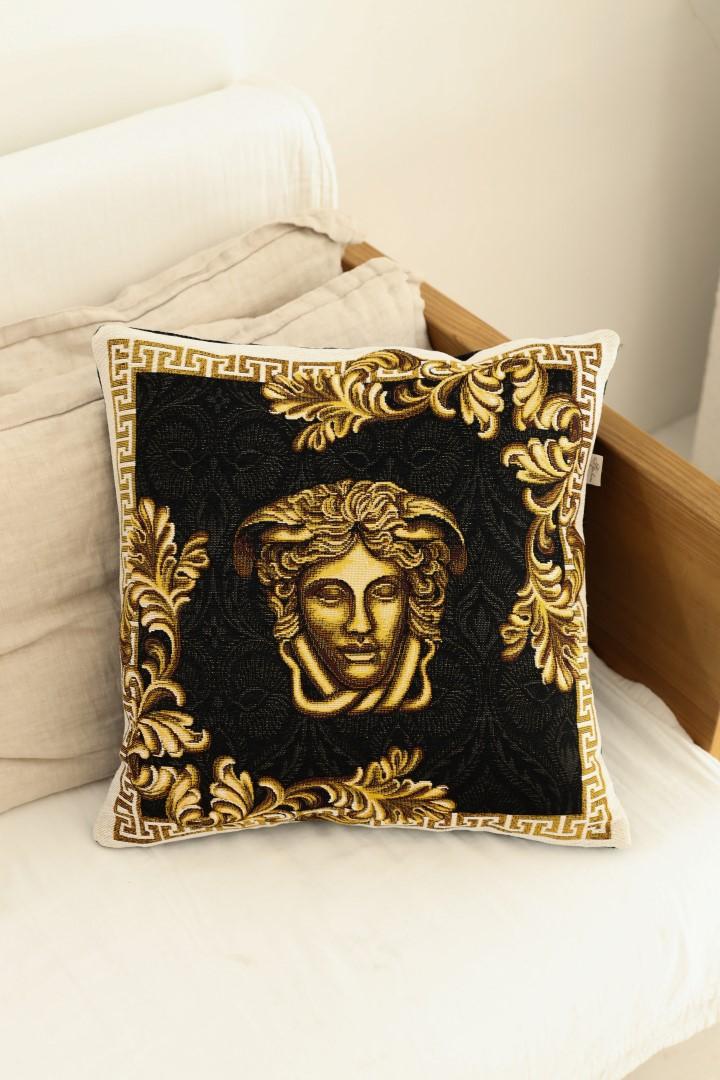 Black and gold baroque tapestry pillow cover on a white sofa