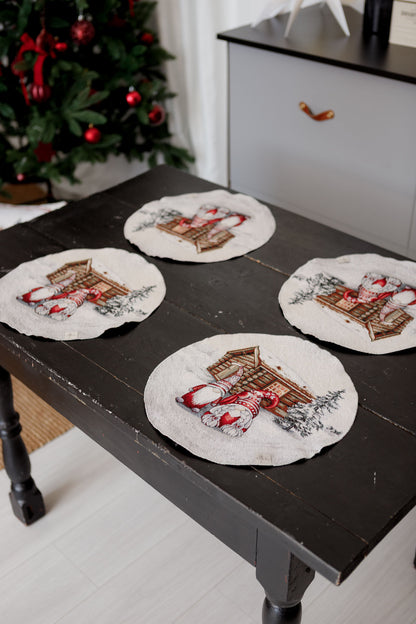 Close-up of Christmas tapestry placemats with gnome and cottage design arranged on dining table