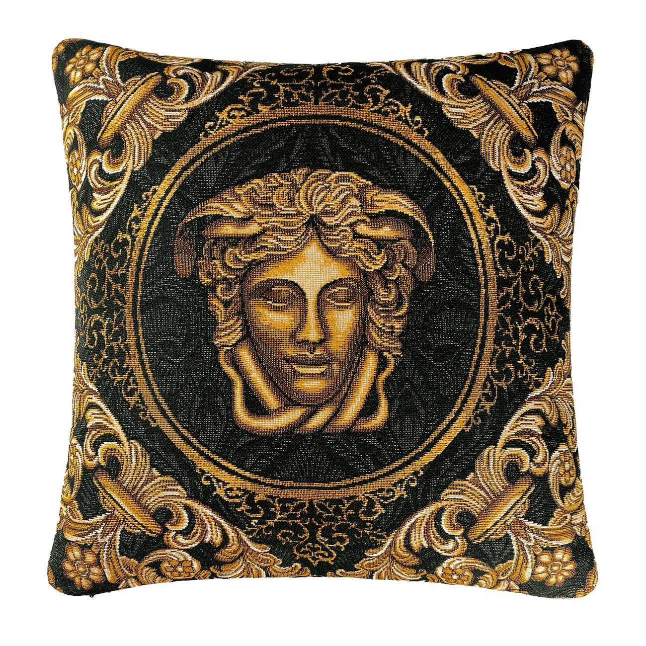 Close-up of Medusa head design on black and gold baroque tapestry pillowcase