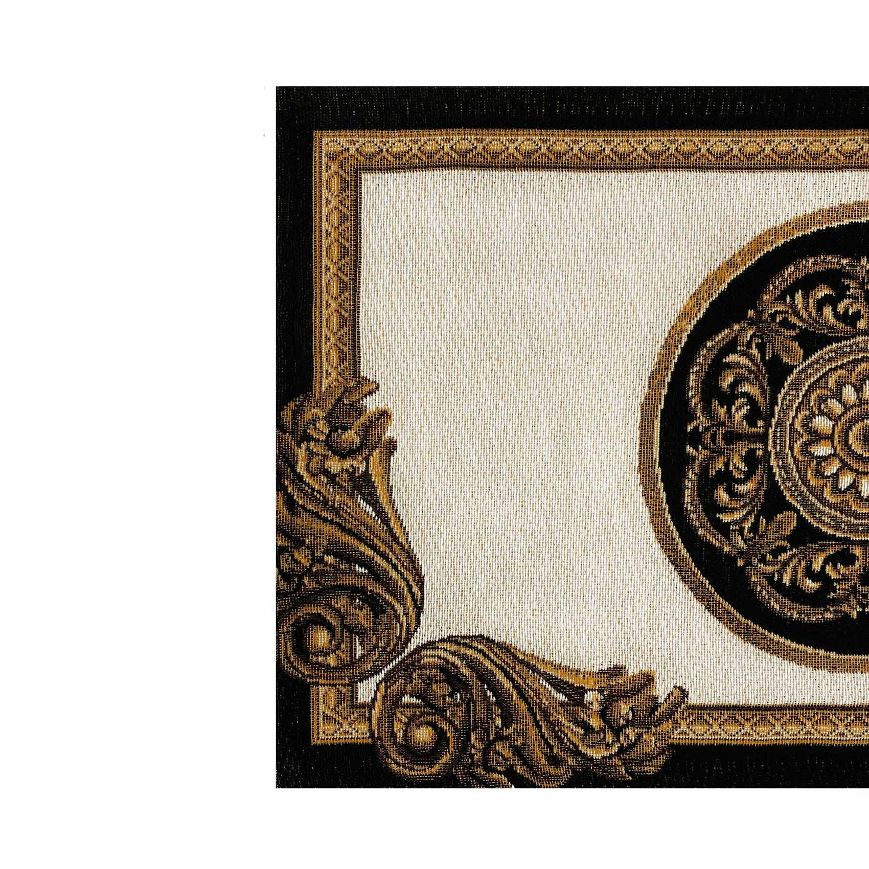 Close-up of baroque medallion tapestry placemat showing gold ornamental details and woven texture