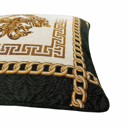 Close-up of baroque tapestry pillowcase with golden chains and Greek key pattern in white, gold, and black colors.