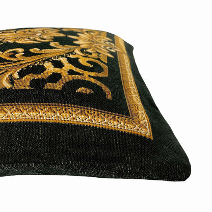 Close-up of black and gold baroque tapestry pillowcase showing detailed woven texture and gold scrollwork border