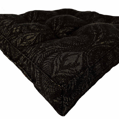 Close-up of black baroque chair pad fabric with subtle woven pattern
