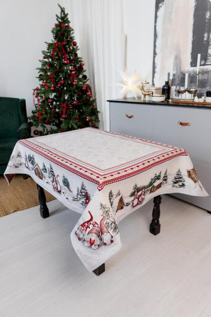 Cozy winter dining table with gnomes tapestry cloth and Christmas tree