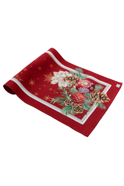 Festive holiday table decor with red poinsettia table runner and Christmas ornaments