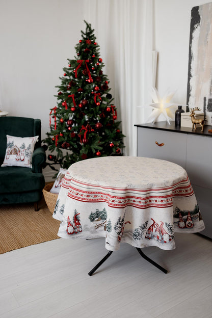 Festive round Christmas tablecloth displayed on table in holiday interior
