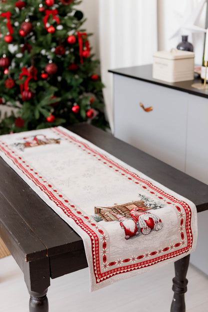 Holiday table runner with gnome design styled on rustic table in festive living room.