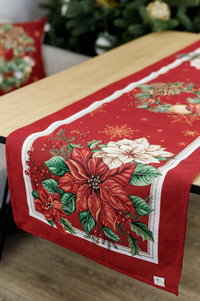 Luxury red poinsettia Christmas tapestry table runner on holiday dining table