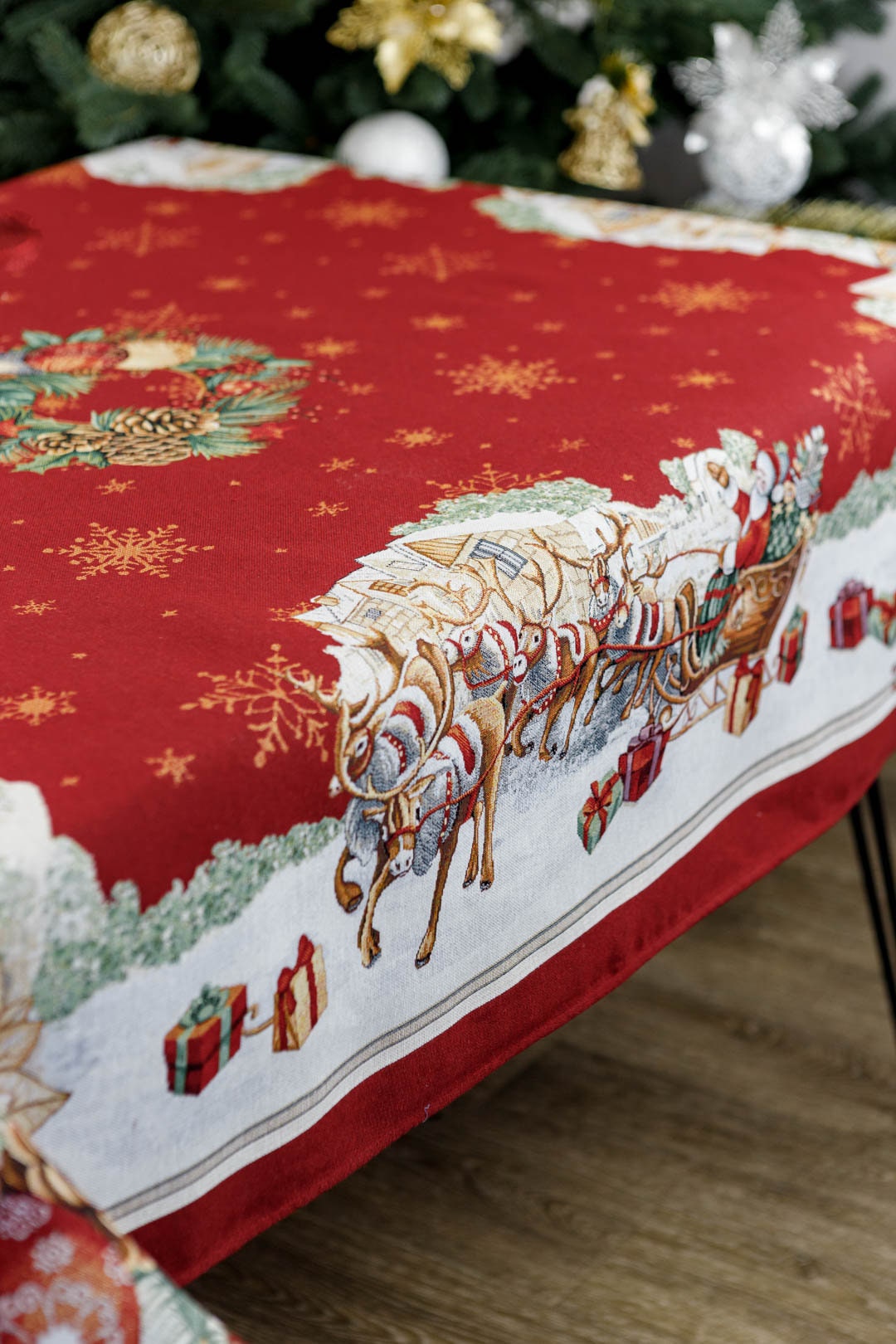 Red Christmas tablecloth with reindeers and Santa, festive dining room decoration
