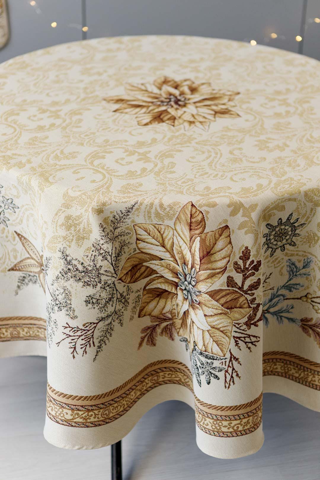Round woven tapestry tablecloth with Christmas poinsettia flower design. Beige and gold. Made in Ukraine.