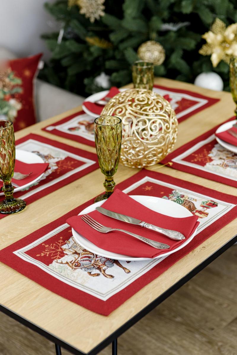 Set of 4 red Christmas placemats on holiday table