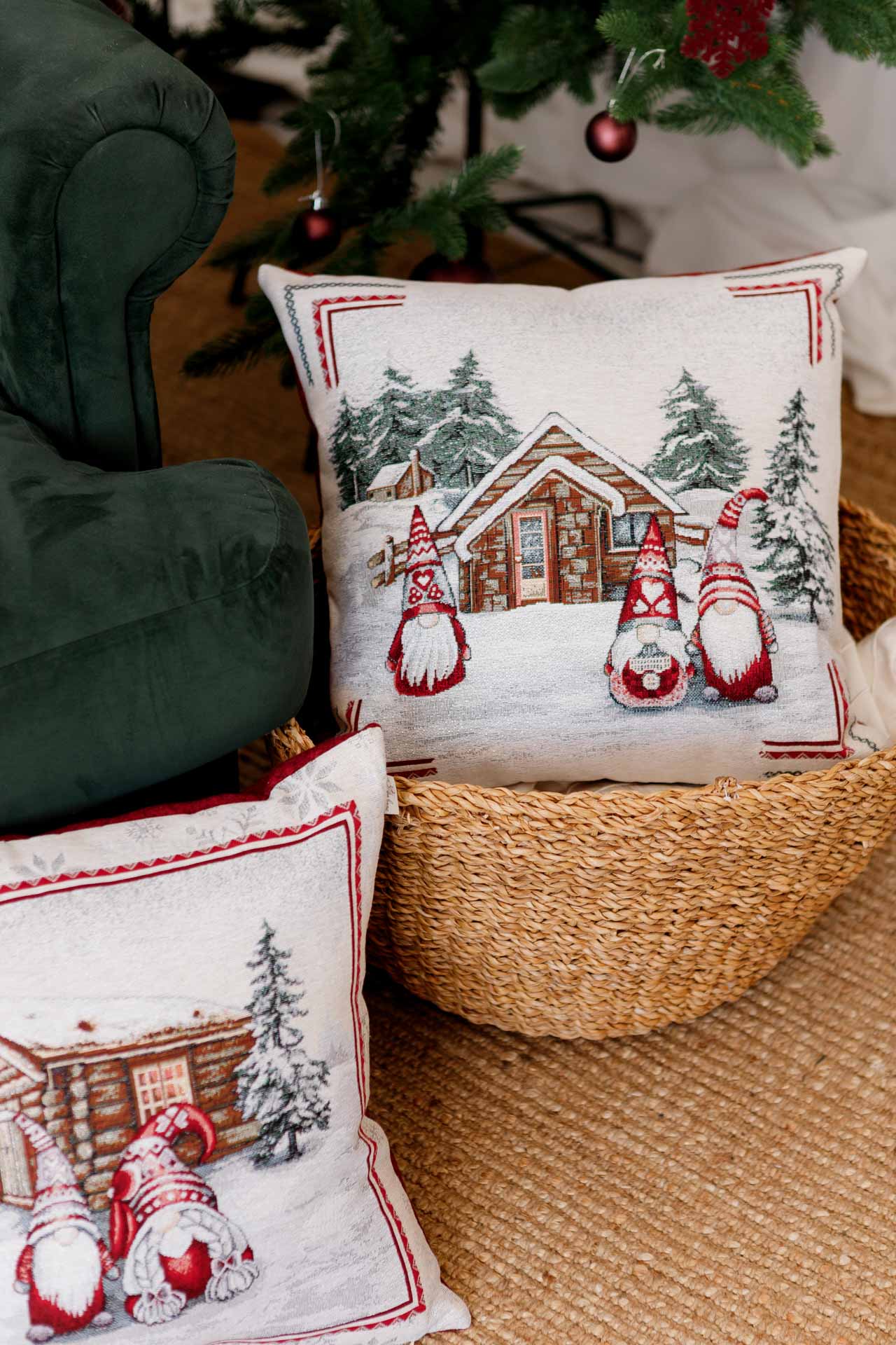 Set of Christmas tapestry pillowcases with gnomes and cottage in cozy holiday interior