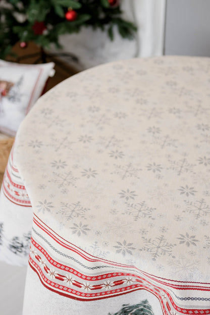 Snowflake pattern close-up on white jacquard Christmas tablecloth