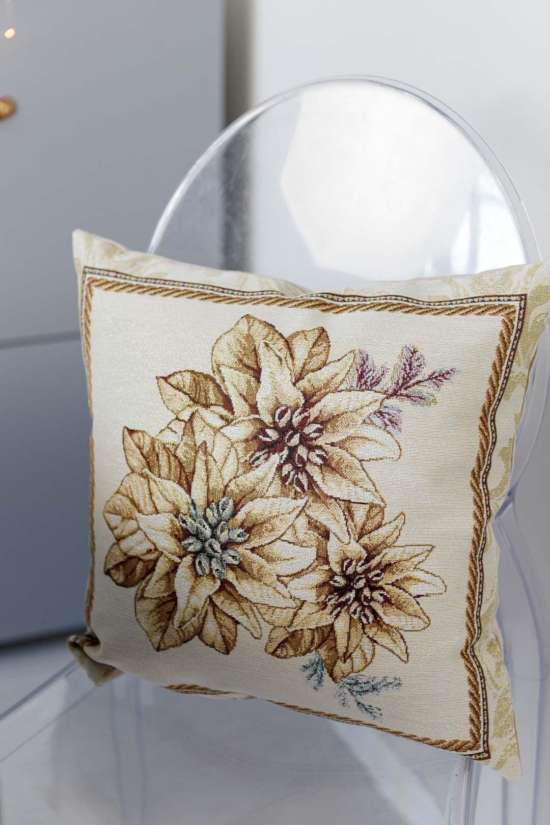 Tapestry Christmas pillowcase with poinsettia floral pattern in beige and gold. Cozy holiday home decor. Made in Ukraine.
