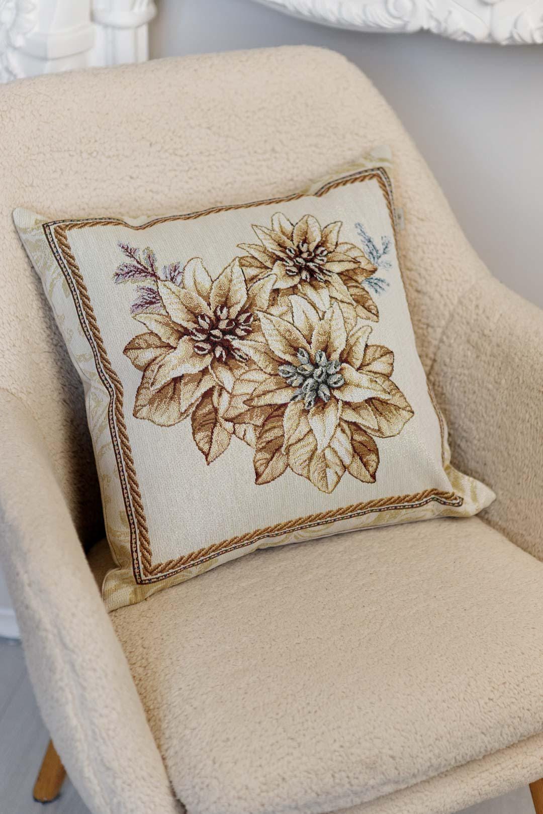 Tapestry Christmas pillowcase with poinsettia floral pattern in beige and gold. Cozy holiday home decor. Made in Ukraine.
