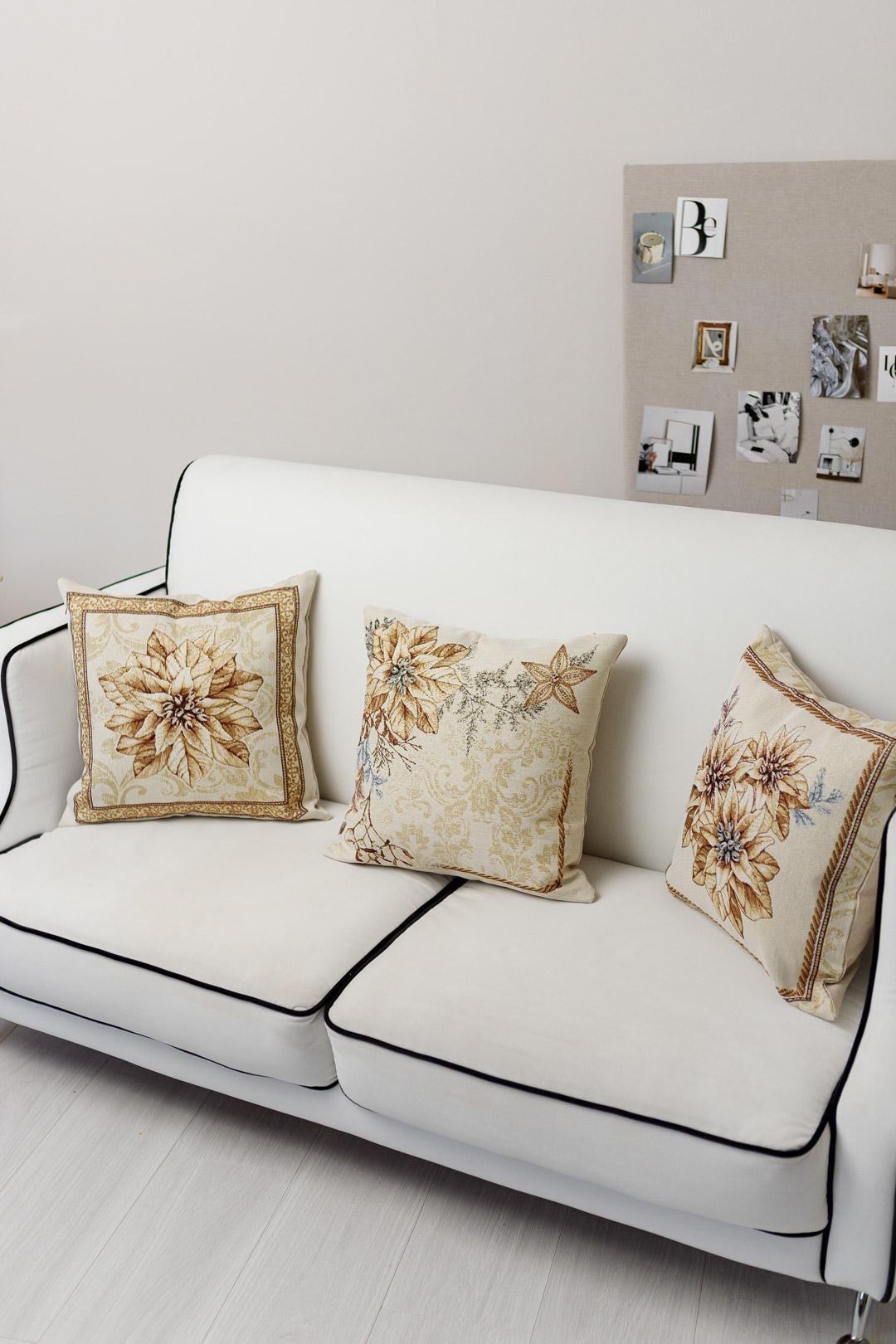 Tapestry pillowcase with Christmas poinsettia floral design. Beige and gold festive home decor. Made in Ukraine.