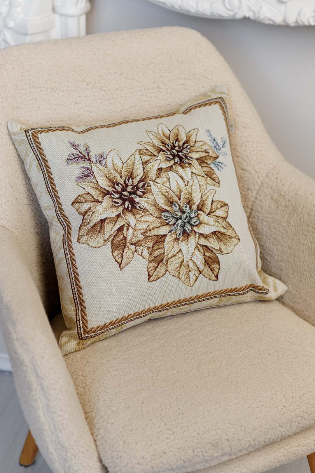 Tapestry pillowcase with Christmas poinsettia floral design. Beige and gold festive home decor. Made in Ukraine.