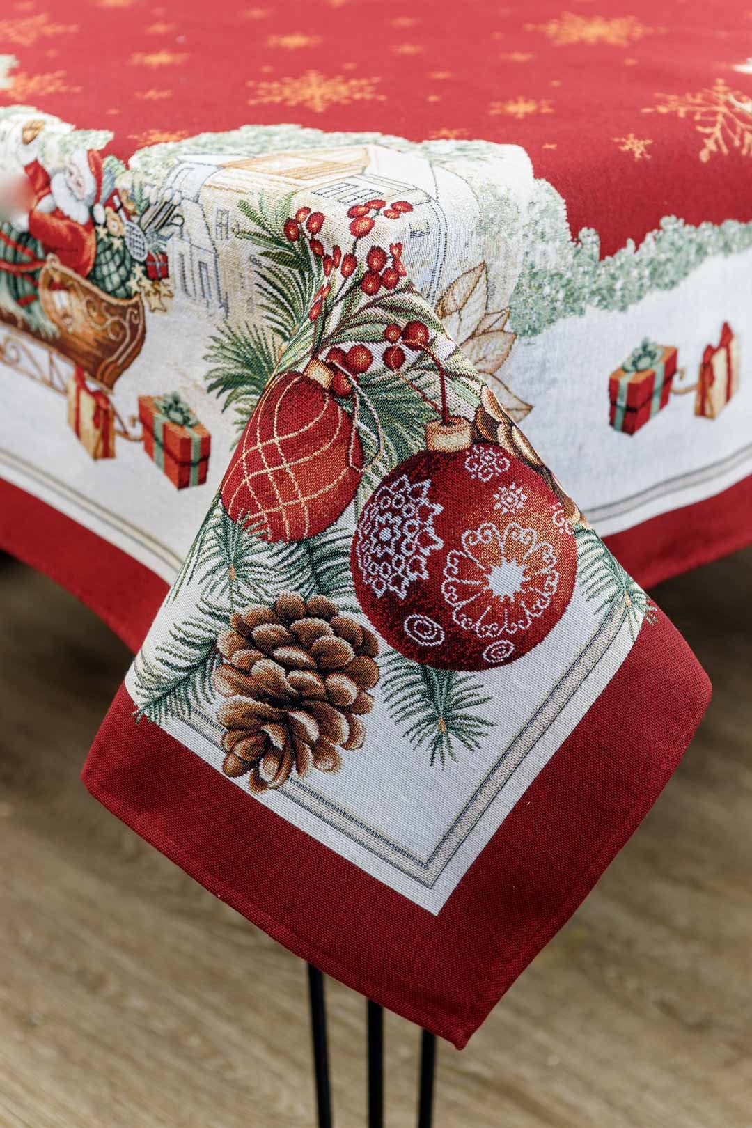 Tapestry texture close-up, red Christmas fabric with Santa design