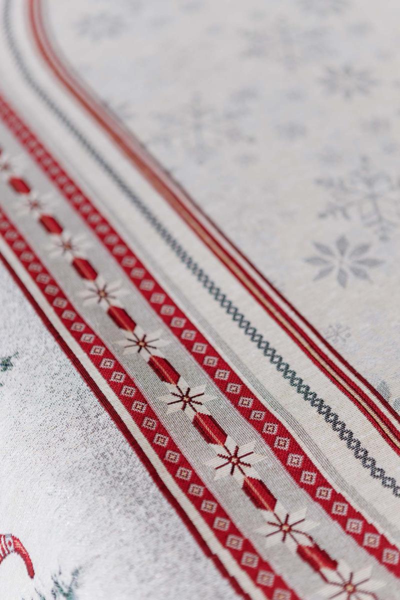 Textured tapestry fabric with snowflake pattern on Christmas tablecloth