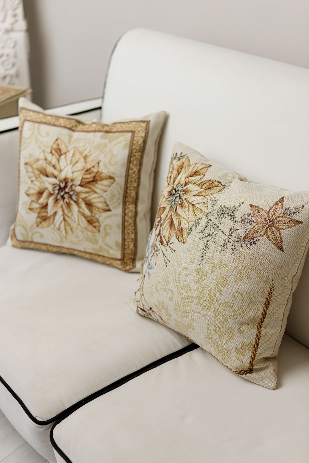 Two tapestry pillowcases with Christmas poinsettia floral design. Beige and gold festive home decor. Made in Ukraine.
