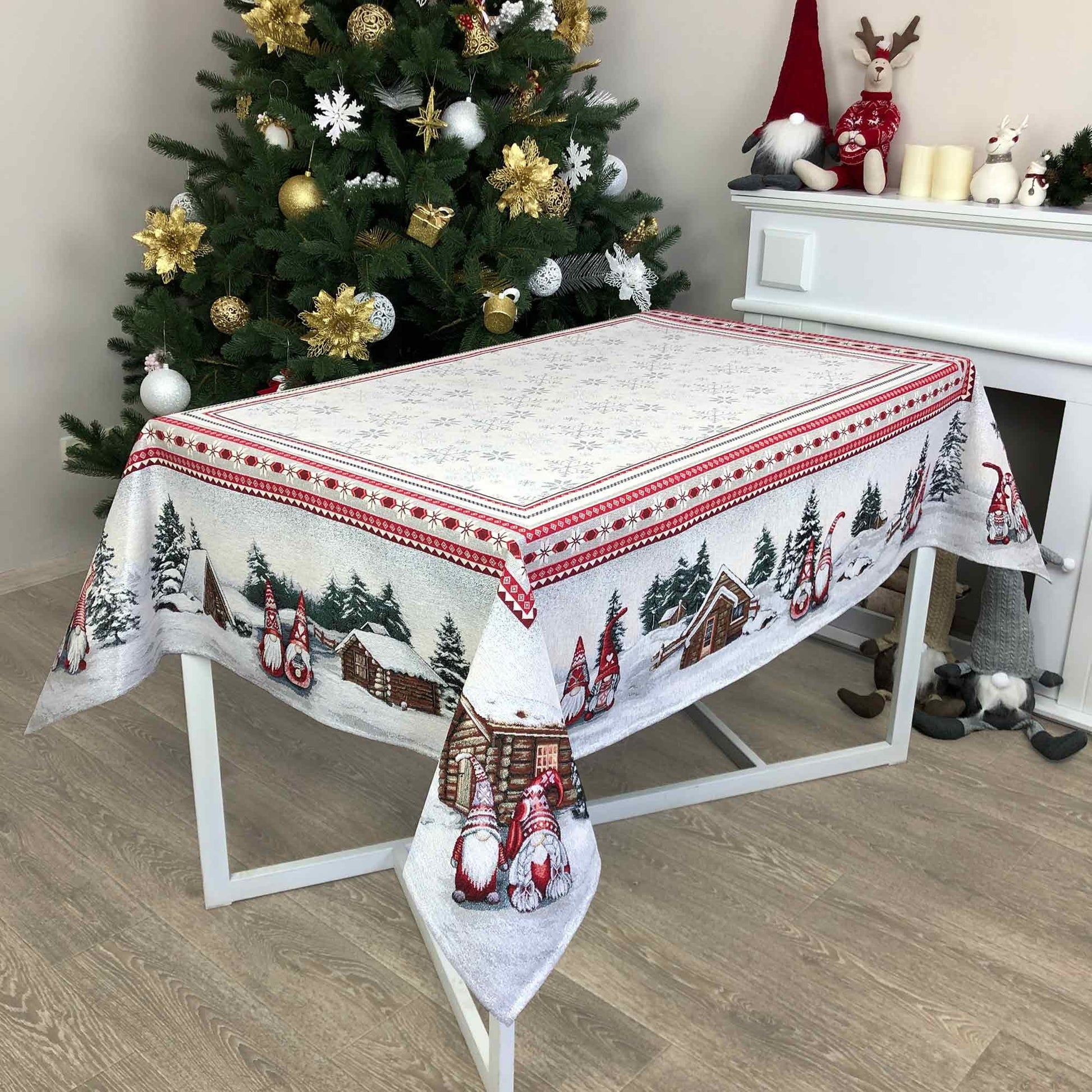 White Christmas tapestry tablecloth with gnomes and snowy cottage on dining table
