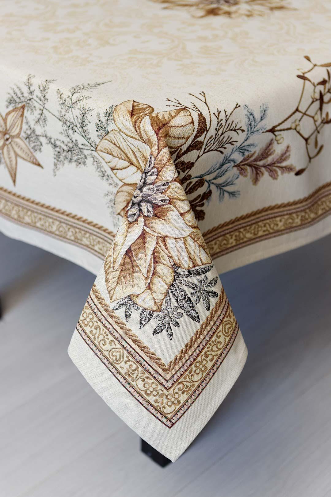 Woven tapestry tablecloth with Christmas poinsettia flower design. Beige and gold. Made in Ukraine.